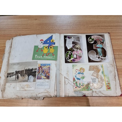 236 - A good scrap album complete to the end filled with mostly  early vintage Christmas and greeting card... 