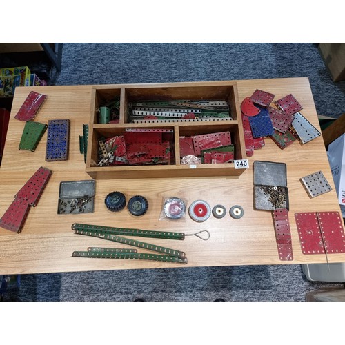 240 - A box containing a large quantity of vintage Meccano to include some rare pieces, please study the p... 
