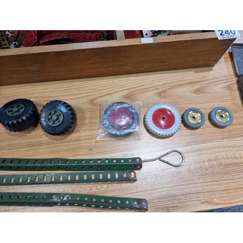 240 - A box containing a large quantity of vintage Meccano to include some rare pieces, please study the p... 