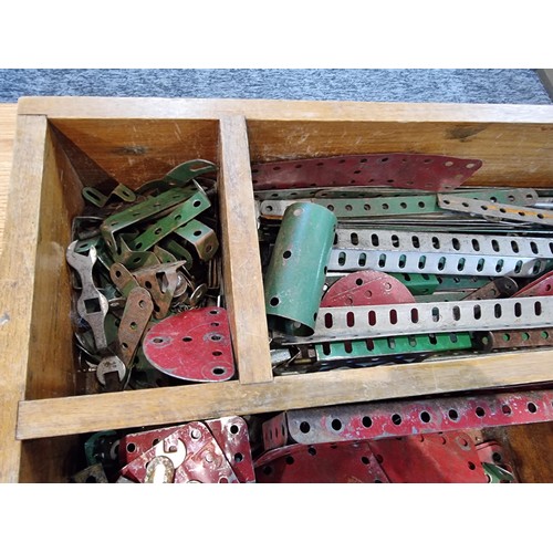 240 - A box containing a large quantity of vintage Meccano to include some rare pieces, please study the p... 
