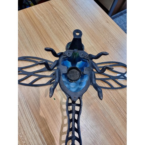 242 - A rare unusual cast iron dragonfly wall hanging tea light holder with hand blown glass, in excellent... 