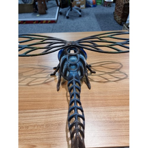 242 - A rare unusual cast iron dragonfly wall hanging tea light holder with hand blown glass, in excellent... 