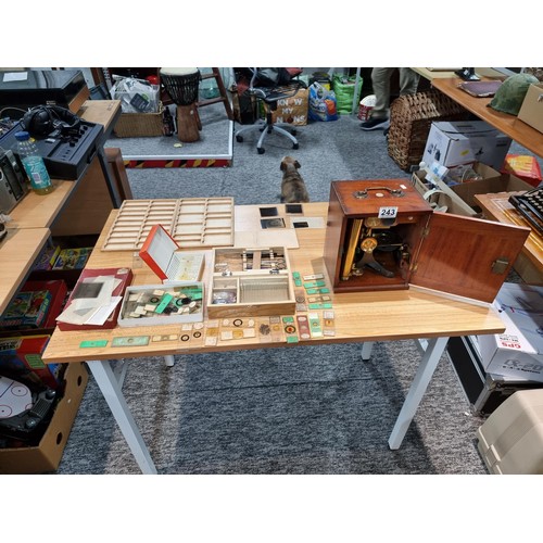 243 - A good quality cased microscope by A.Franks Manchester and Hull along with a large quantity of speci... 