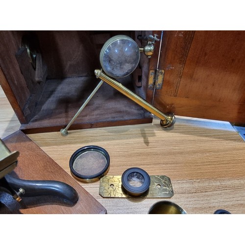 243 - A good quality cased microscope by A.Franks Manchester and Hull along with a large quantity of speci... 