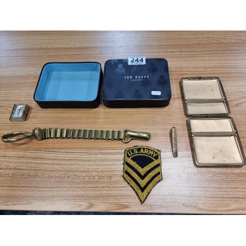 244 - A box containing a quantity of collectables to include a miniature bible and heavy duty brass chain ... 