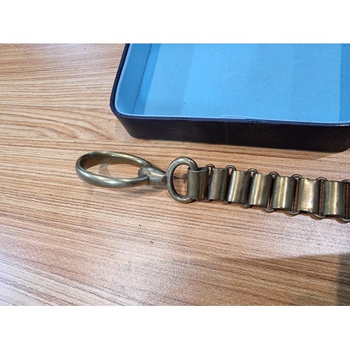 244 - A box containing a quantity of collectables to include a miniature bible and heavy duty brass chain ... 