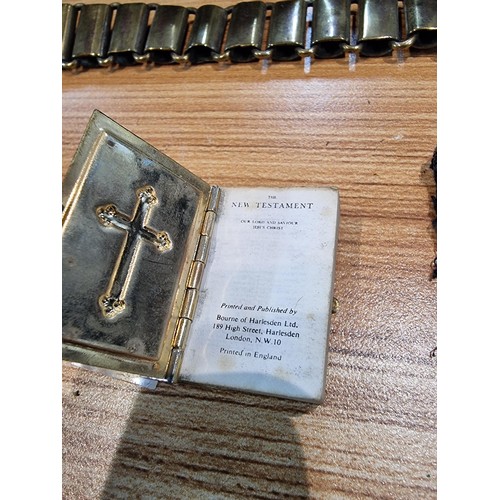 244 - A box containing a quantity of collectables to include a miniature bible and heavy duty brass chain ... 
