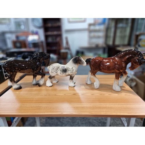 246 - 3 large impressive ceramic cart horses in 3 different colours. 2 have indistinct marks and one has a... 