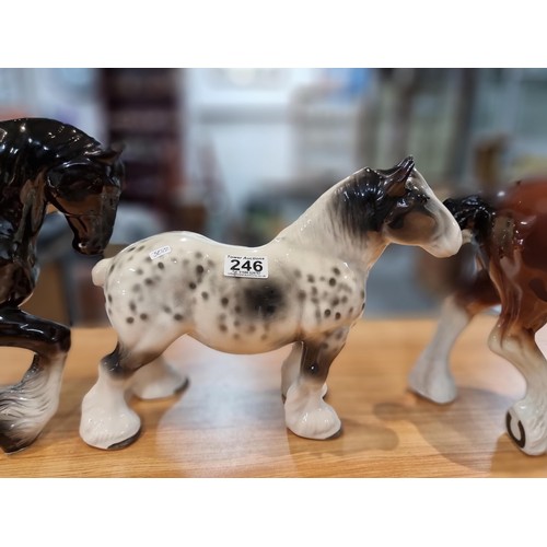 246 - 3 large impressive ceramic cart horses in 3 different colours. 2 have indistinct marks and one has a... 