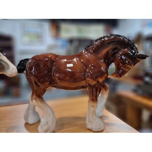 246 - 3 large impressive ceramic cart horses in 3 different colours. 2 have indistinct marks and one has a... 