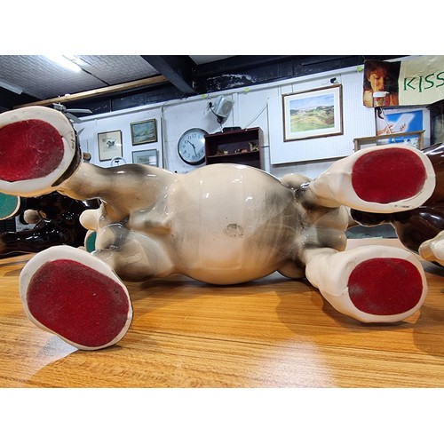 246 - 3 large impressive ceramic cart horses in 3 different colours. 2 have indistinct marks and one has a... 