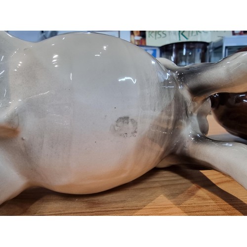 246 - 3 large impressive ceramic cart horses in 3 different colours. 2 have indistinct marks and one has a... 
