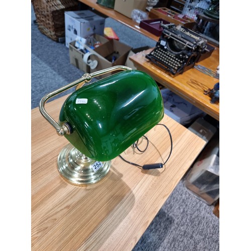 252 - A good quality bankers lamp with a green glass shade, in clean condition but requires a new plug. Ha... 