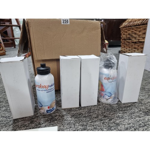 258 - A box of mostly stationary odds to include many pens, 4 boxed as new metal water bottles, pen and no... 