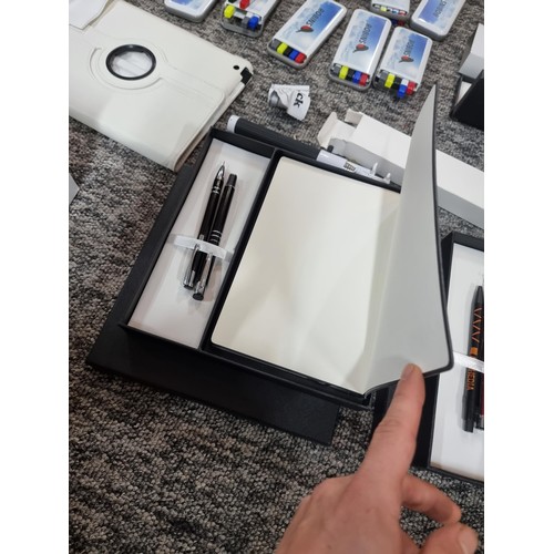 258 - A box of mostly stationary odds to include many pens, 4 boxed as new metal water bottles, pen and no... 