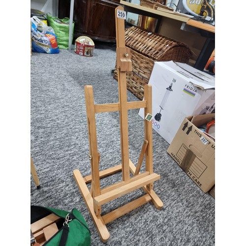 259 - 3x good wooden artists easels including a cased ease all in good condition.