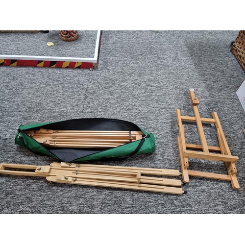259 - 3x good wooden artists easels including a cased ease all in good condition.