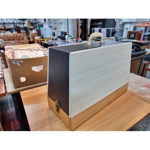 261 - A good quality Read's model 300 sewing machine complete with its foot pedal, original case, and orig... 