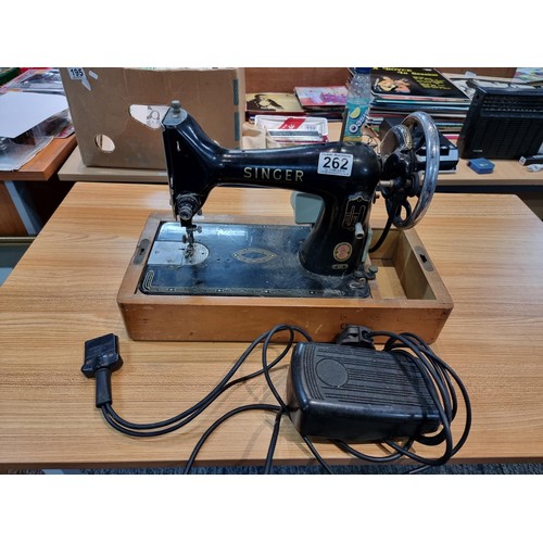 262 - A Singer 99K sewing machine with foot pedal.