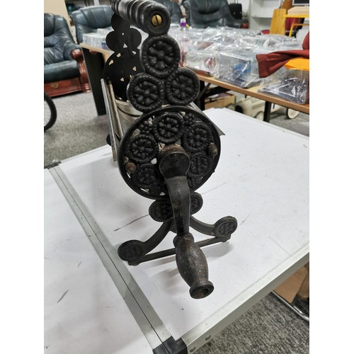 271 - Cast iron dispenser for card paper with ornate edging stands at 36cm high, 55cm long 20cm deep