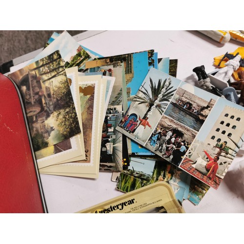 272 - A vintage suitcase full of various toys to inc star wars figures, giant pencil, military figures, ac... 