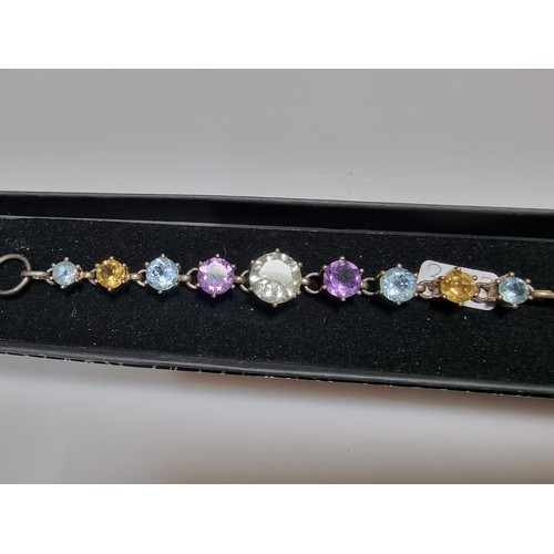 288 - A pretty 925 silver multi gemstone bracelet inset with real quartz, amethyst, topaz, and citrine, in... 
