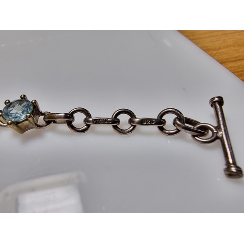288 - A pretty 925 silver multi gemstone bracelet inset with real quartz, amethyst, topaz, and citrine, in... 