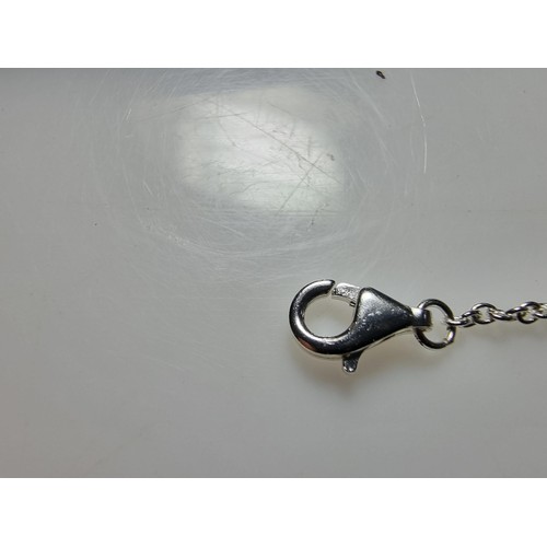 290 - A 925 silver bracelet with a flower charm inset with 15 small diamonds by Katie Loxton, in clean con... 