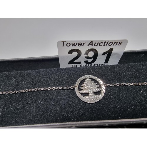 291 - A 925 silver bracelet with a tree charm in good clean condition, boxed. Length of 7
