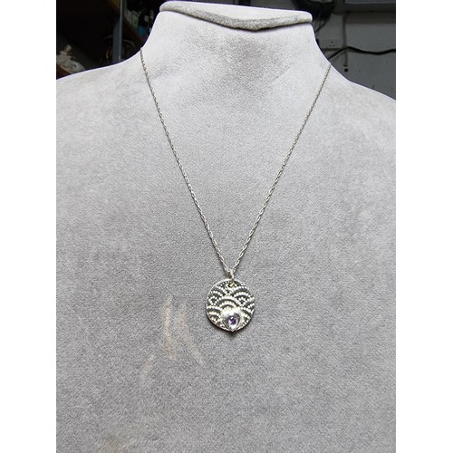 305 - A 925 silver handmade pendant inset with a amethyst set on a long 20