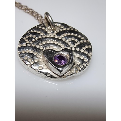 305 - A 925 silver handmade pendant inset with a amethyst set on a long 20