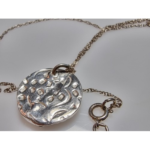 305 - A 925 silver handmade pendant inset with a amethyst set on a long 20