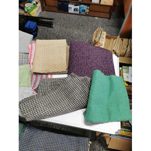 283 - Box containing a quantity of craft samples and throws inc a tartan wool blanket, cotton fabrics, vin... 