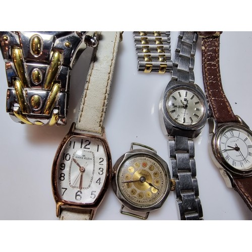 321 - A quantity of watches along with a quantity of costume earrings to include a a genuine Tissot sea st... 