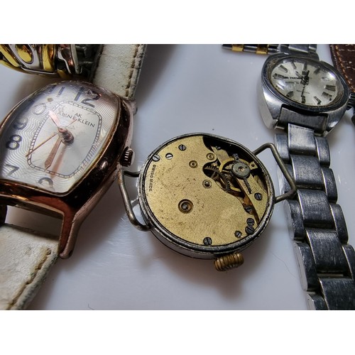 321 - A quantity of watches along with a quantity of costume earrings to include a a genuine Tissot sea st... 