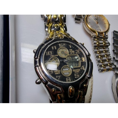 321 - A quantity of watches along with a quantity of costume earrings to include a a genuine Tissot sea st... 