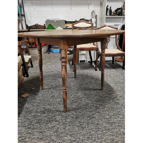 443 - Drop leaf Dinette table light oak in good order, height of 72cm length with leaves up 106cm, leaves ... 