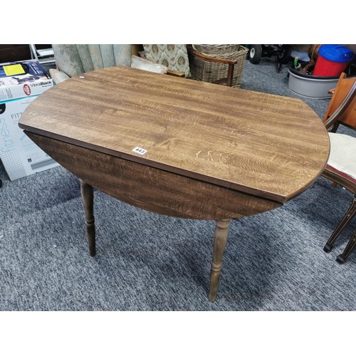 443 - Drop leaf Dinette table light oak in good order, height of 72cm length with leaves up 106cm, leaves ... 