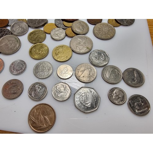 340 - A large quantity of various coins, to include British and world coins.