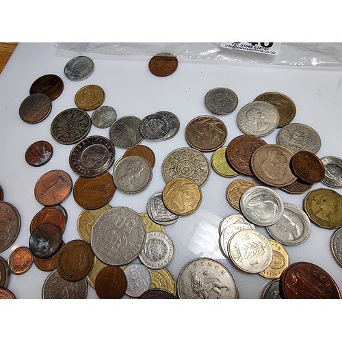 340 - A large quantity of various coins, to include British and world coins.