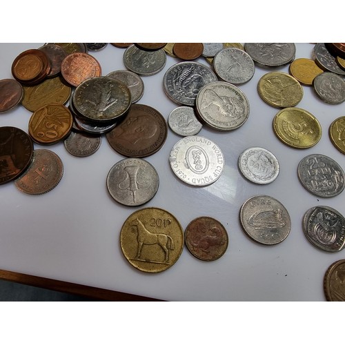 340 - A large quantity of various coins, to include British and world coins.