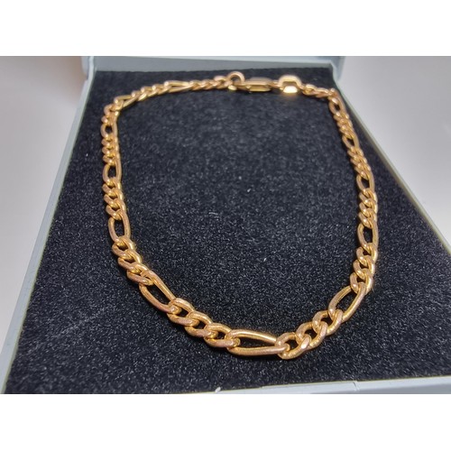347 - A hallmarked 9ct yellow gold Figaro link bracelet in excellent clean condition and boxed. Total leng... 