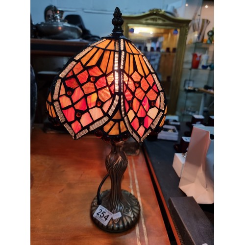 254 - Pretty Tiffany style table lamp with a colourful glass shade in good clean condition working height ... 