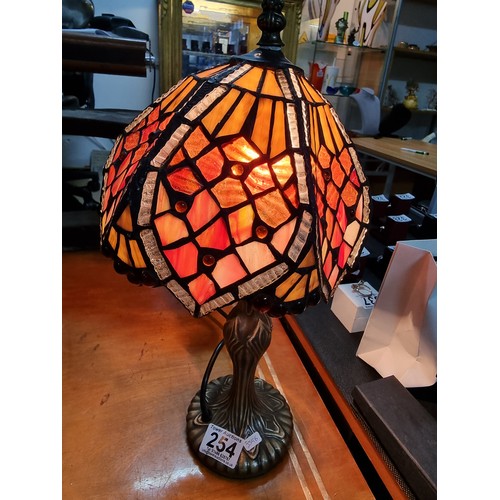 254 - Pretty Tiffany style table lamp with a colourful glass shade in good clean condition working height ... 