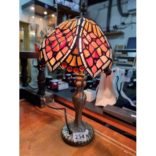 254 - Pretty Tiffany style table lamp with a colourful glass shade in good clean condition working height ... 