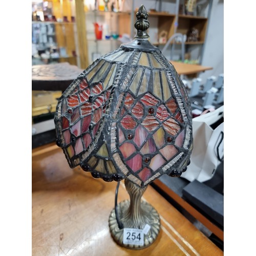 254 - Pretty Tiffany style table lamp with a colourful glass shade in good clean condition working height ... 