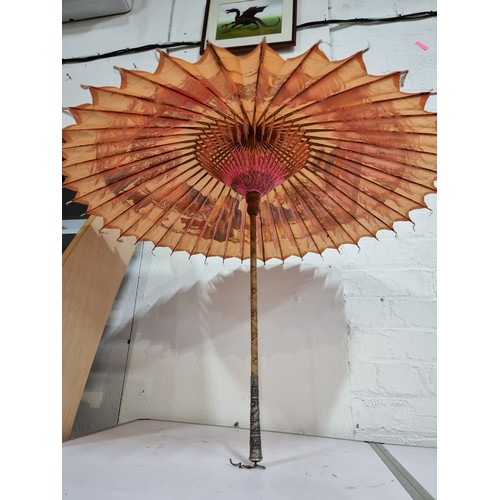 240A - Good antique Indian hand painted parasol with an ornate sterling silver handle and a burn design to ... 