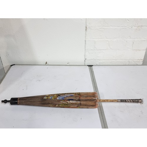 240A - Good antique Indian hand painted parasol with an ornate sterling silver handle and a burn design to ... 