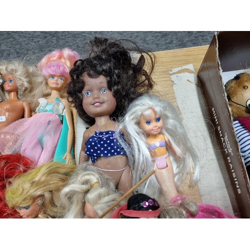 235 - A large quantity of various doll figures to include many Barbie dolls, some are earlier examples fro... 