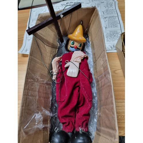 236 - 2 Pelham puppets with paperwork along with a Pelham style puppet and 2 other dolls. One Pelham puppe... 